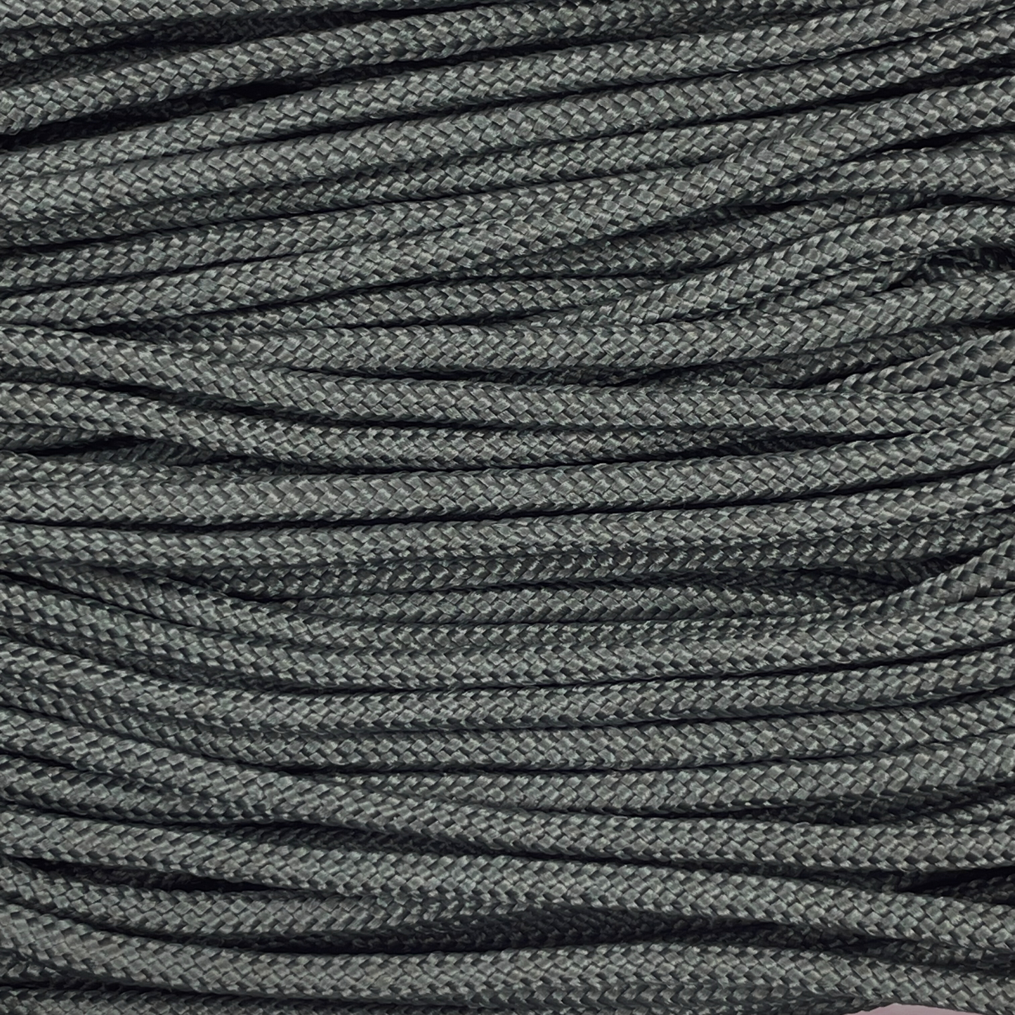 Close-up image of Black 275 Paracord, showcasing the vibrant colour and texture of the material.