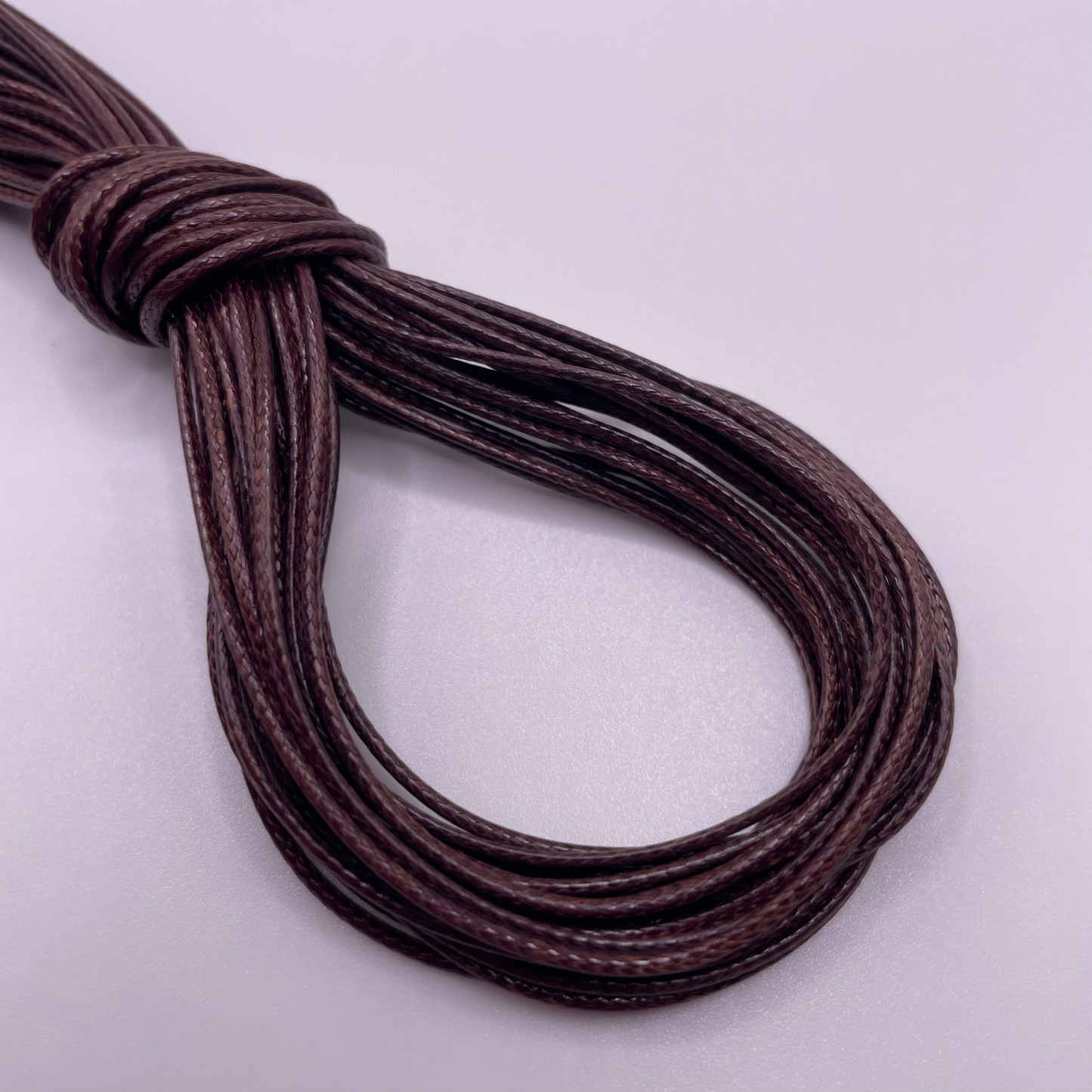 Close-up image of 1mm Waxed Cotton Cord, showcasing the vibrant colour and texture of the material.