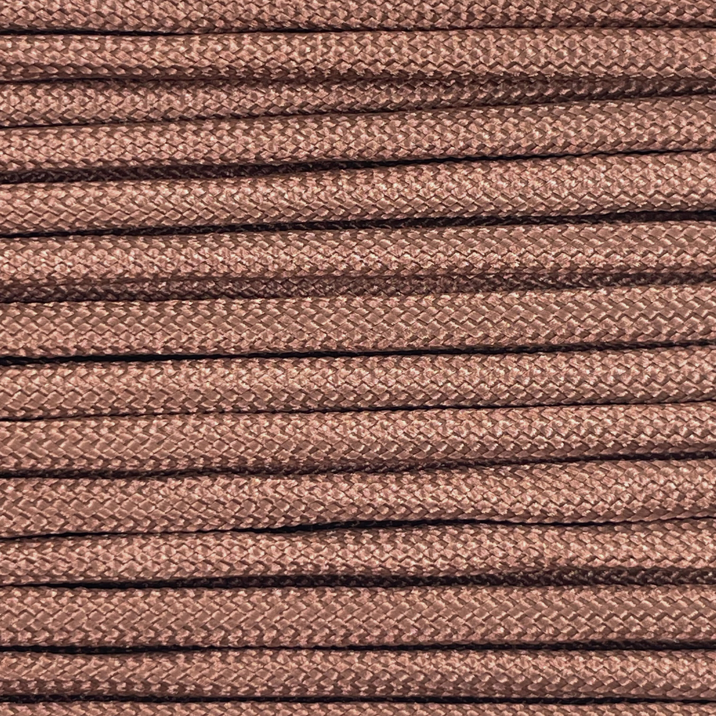 Close-up image of coffee 550 paracord, showcasing the vibrant colour and texture of the material.