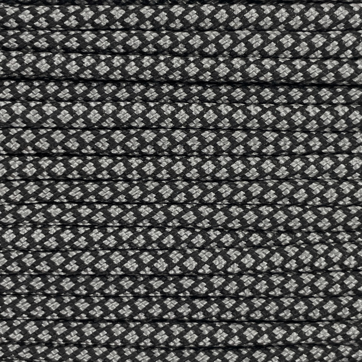 Close-up image of Dark Grey Diamond 550 Paracord, showcasing the vibrant colour and texture of the material.