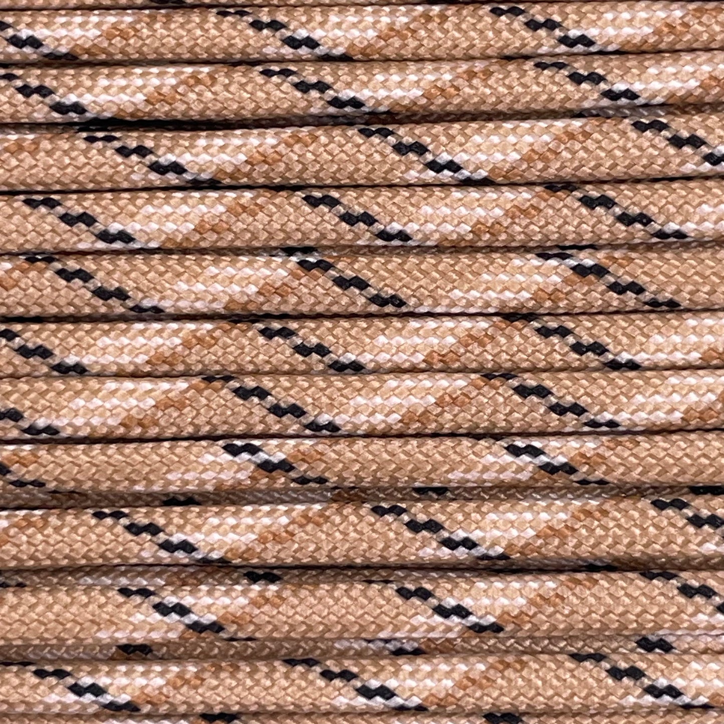 Close-up image of Desert Camo 550 Paracord, showcasing the vibrant colour and texture of the material.