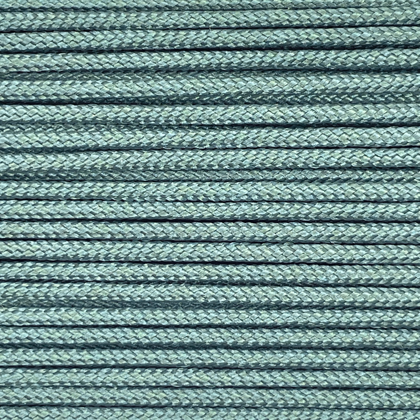 Close-up image of Grey Green 275 Paracord, showcasing the vibrant colour and texture of the material.