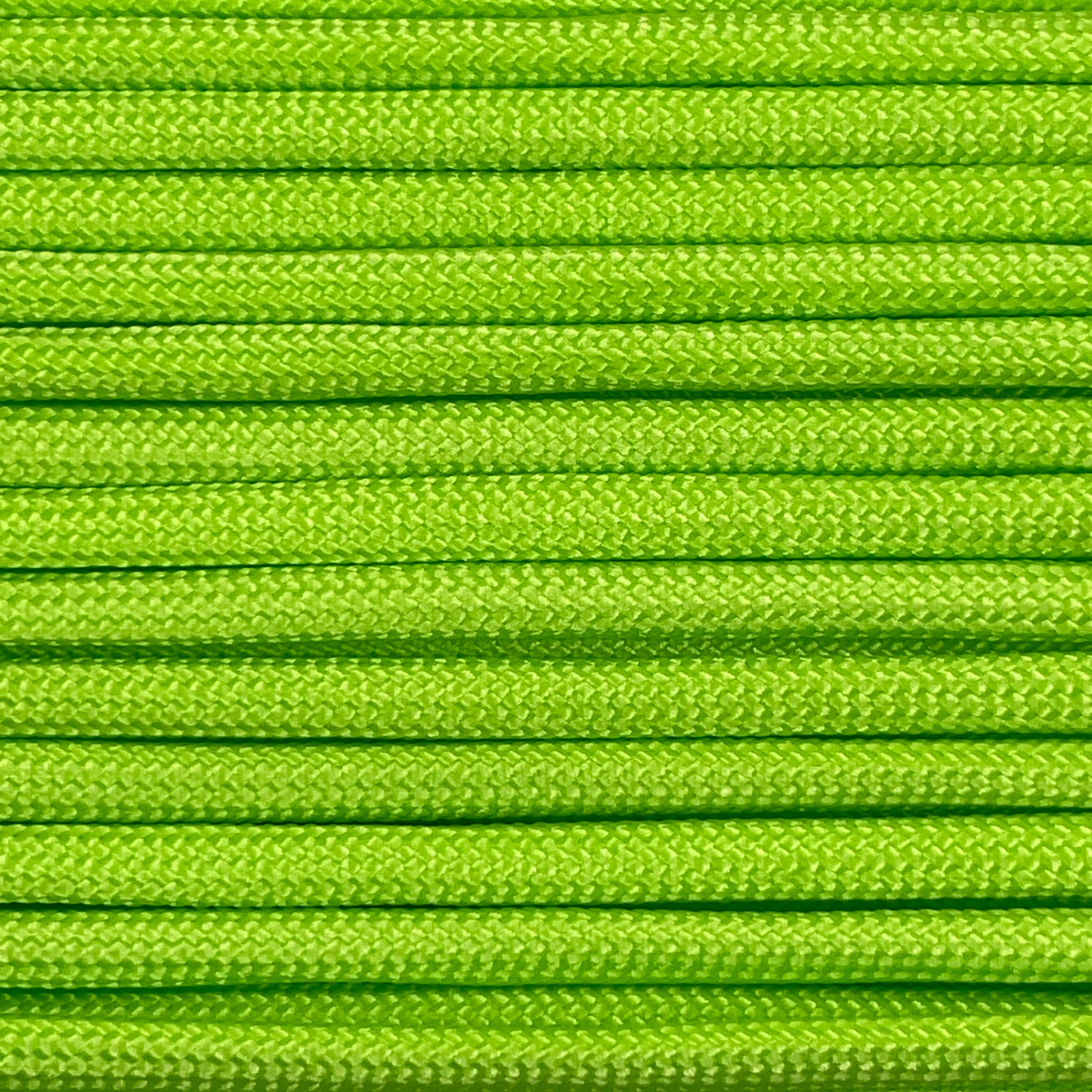 Close-up image of lime green 550 paracord, showcasing the vibrant colour and texture of the material.