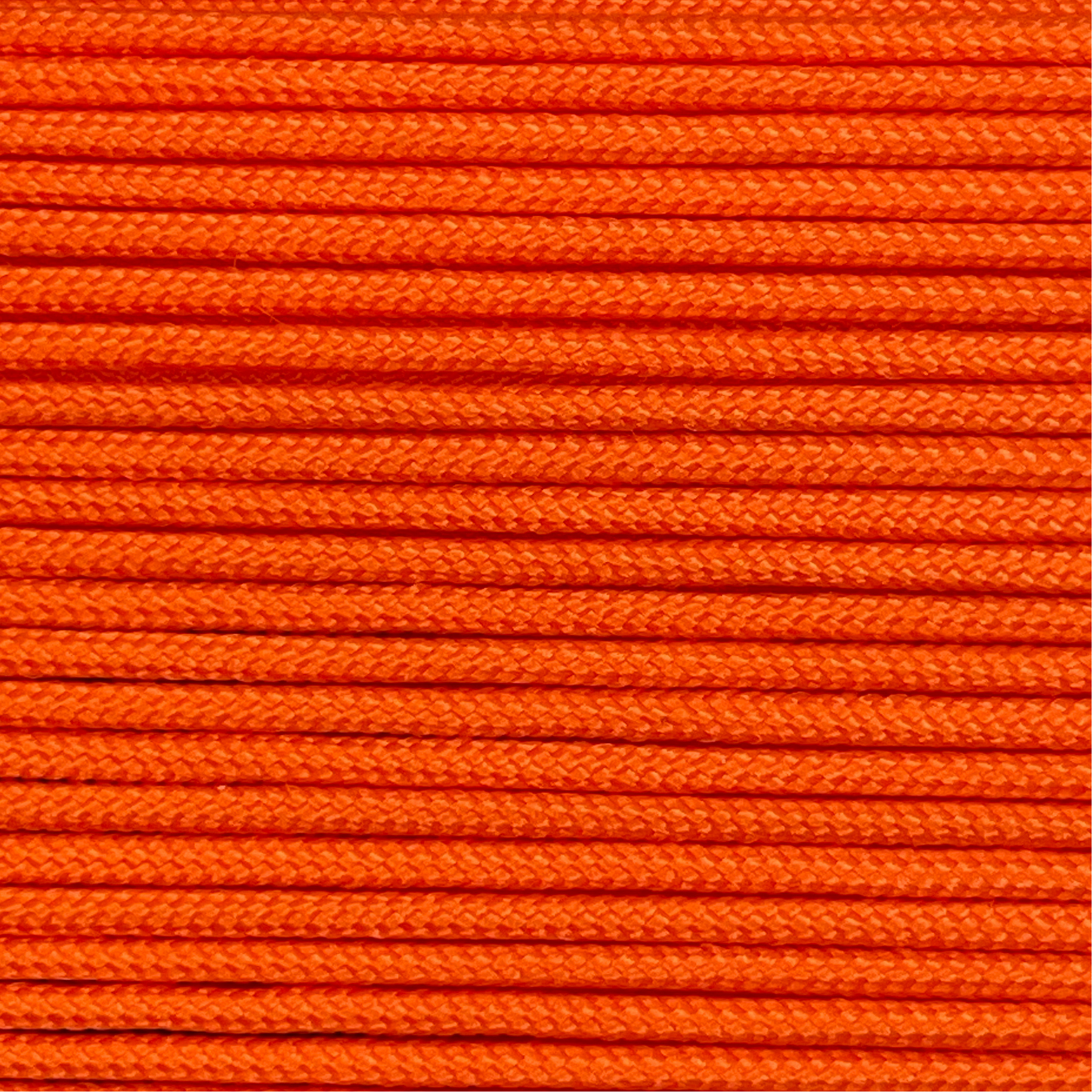 Close-up image of Orange 275 Paracord, showcasing the vibrant colour and texture of the material.