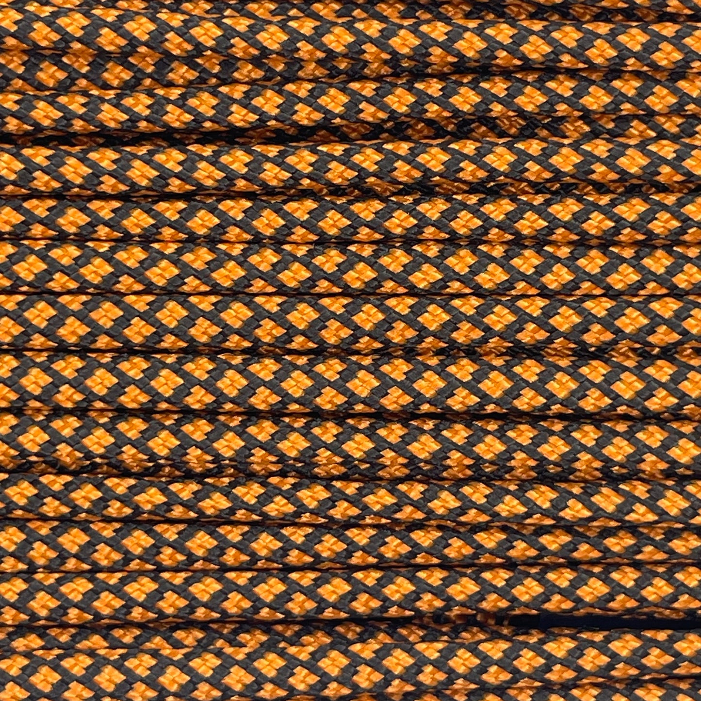 Close-up image of Orange Diamond 550 Paracord, showcasing the vibrant colour and texture of the material.