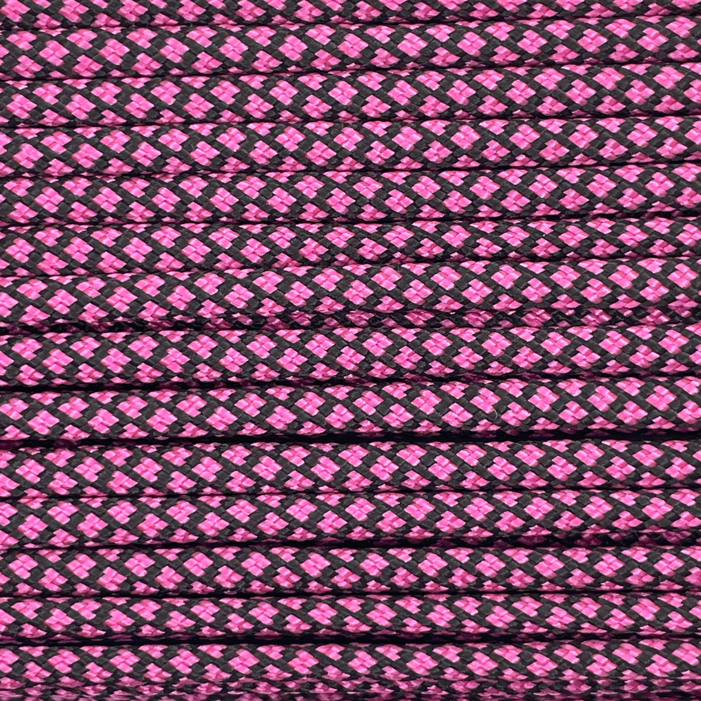 Close-up image of Pink Diamond 550 Paracord, showcasing the vibrant colour and texture of the material.