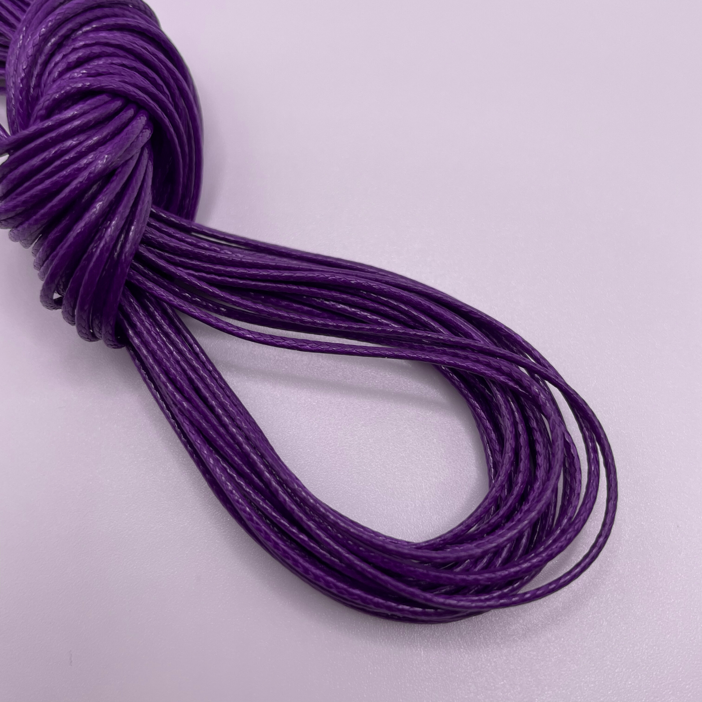 Close-up image of 1mm Waxed Cotton Cord, showcasing the vibrant colour and texture of the material.
