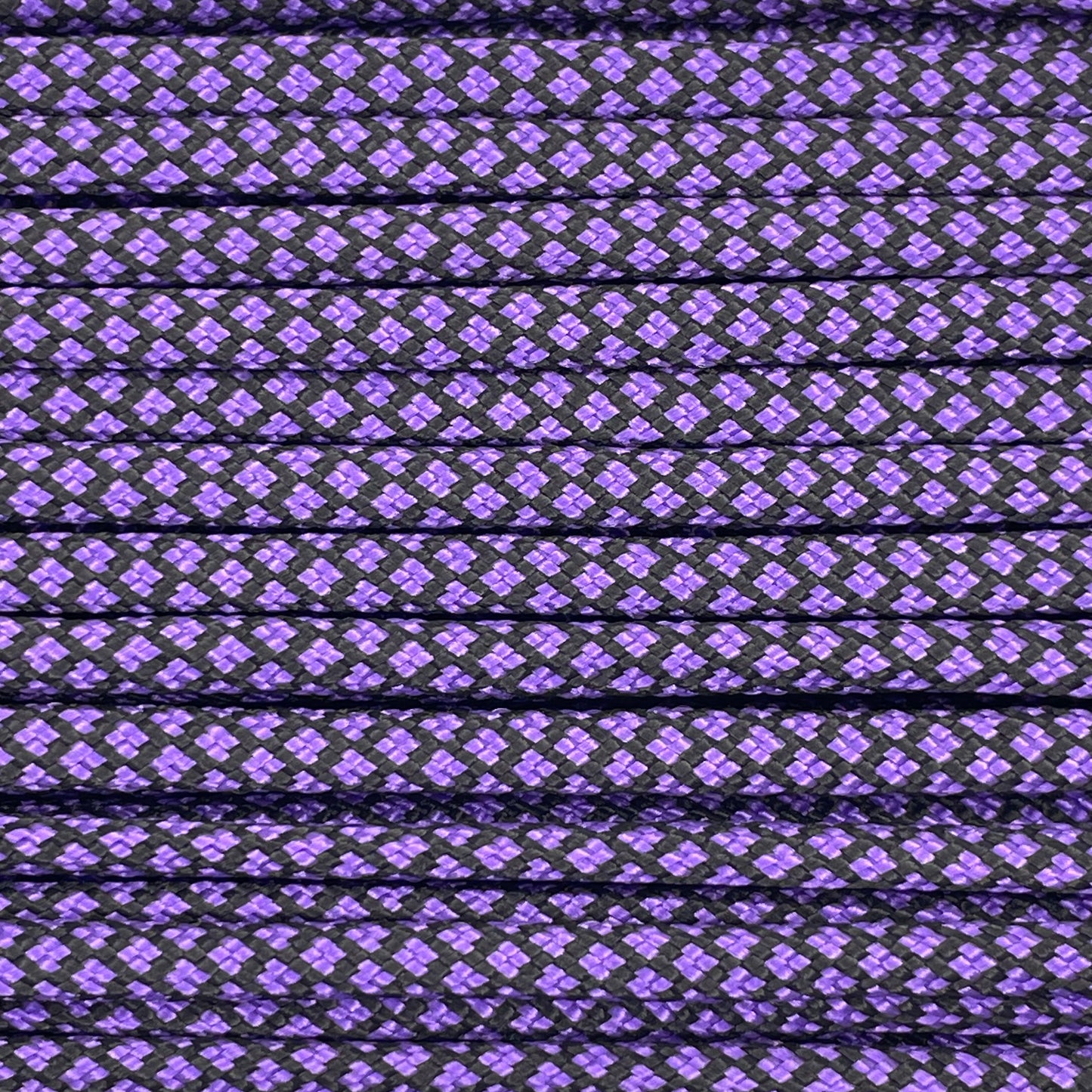 Close-up image of Purple Diamond 550 Paracord, showcasing the vibrant colour and texture of the material.