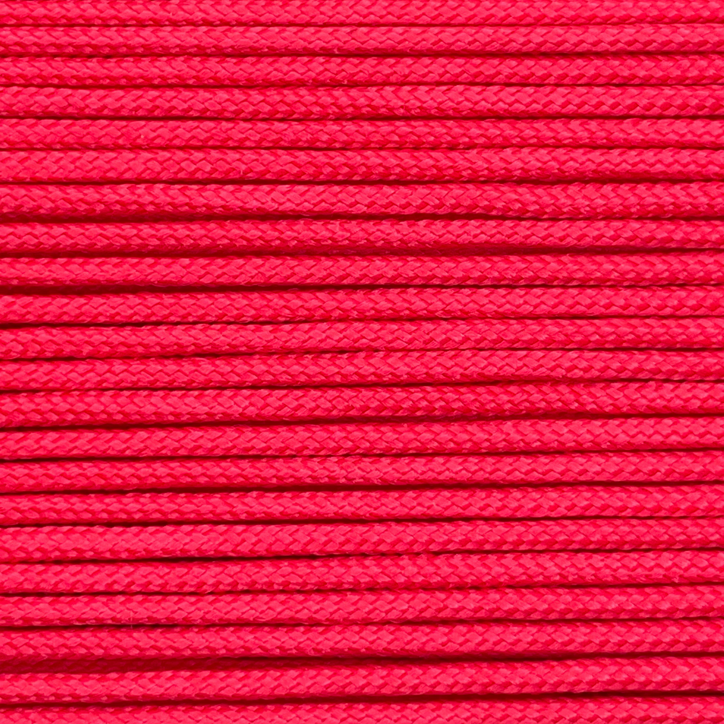 Close-up image of Red 275 Paracord, showcasing the vibrant colour and texture of the material.
