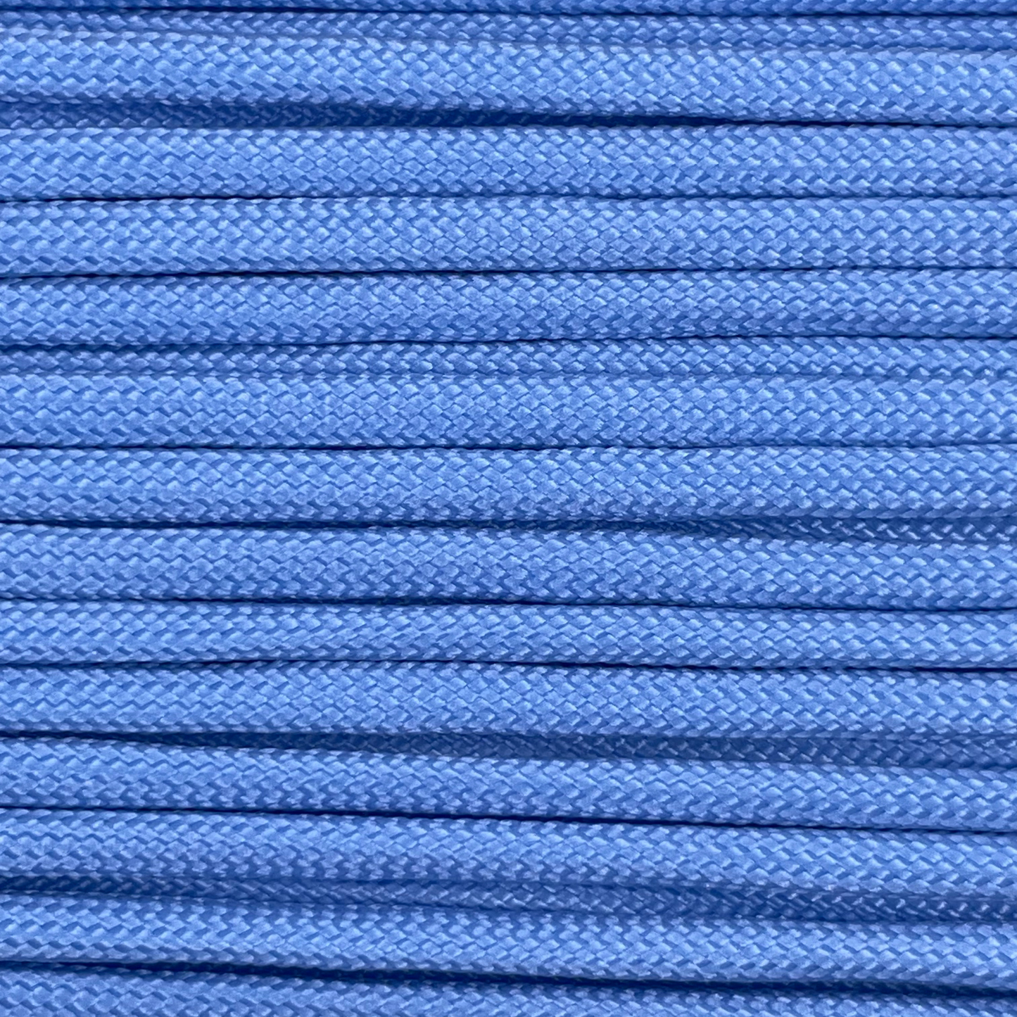 Close-up image of sky blue 550 paracord, showcasing the vibrant colour and texture of the material.