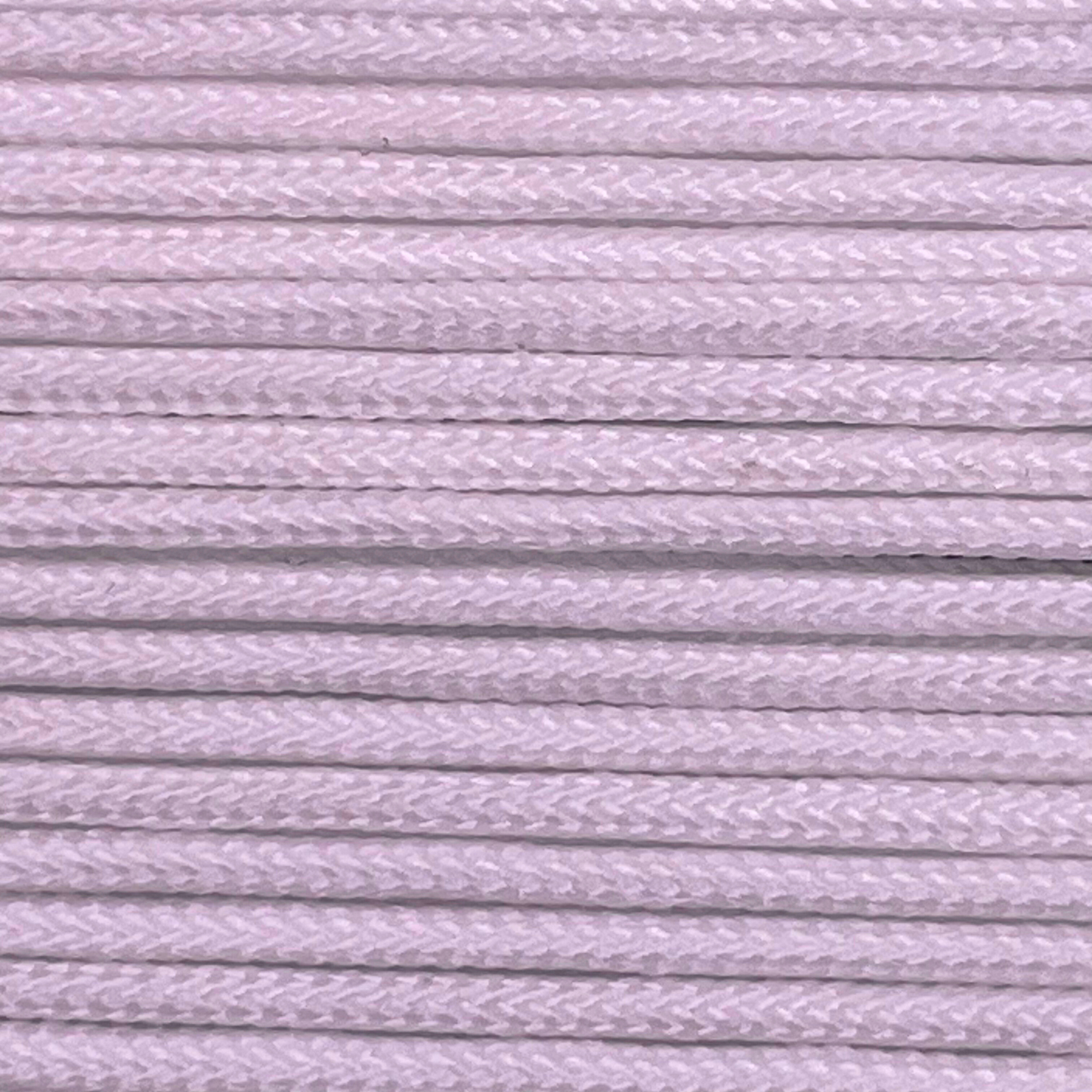 Close-up image of White 275 Paracord, showcasing the vibrant colour and texture of the material.