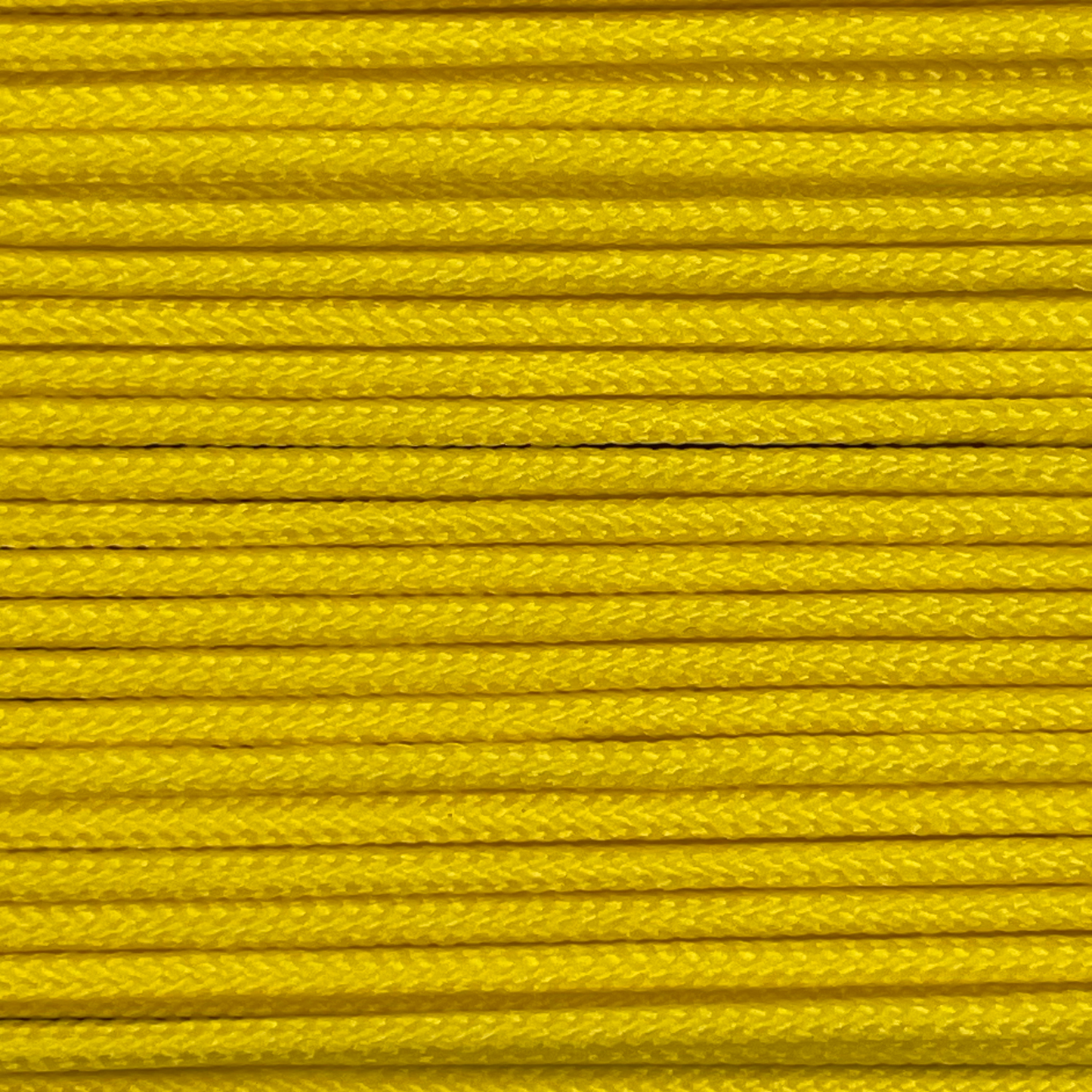 Close-up image of Yellow 275 Paracord, showcasing the vibrant colour and texture of the material.