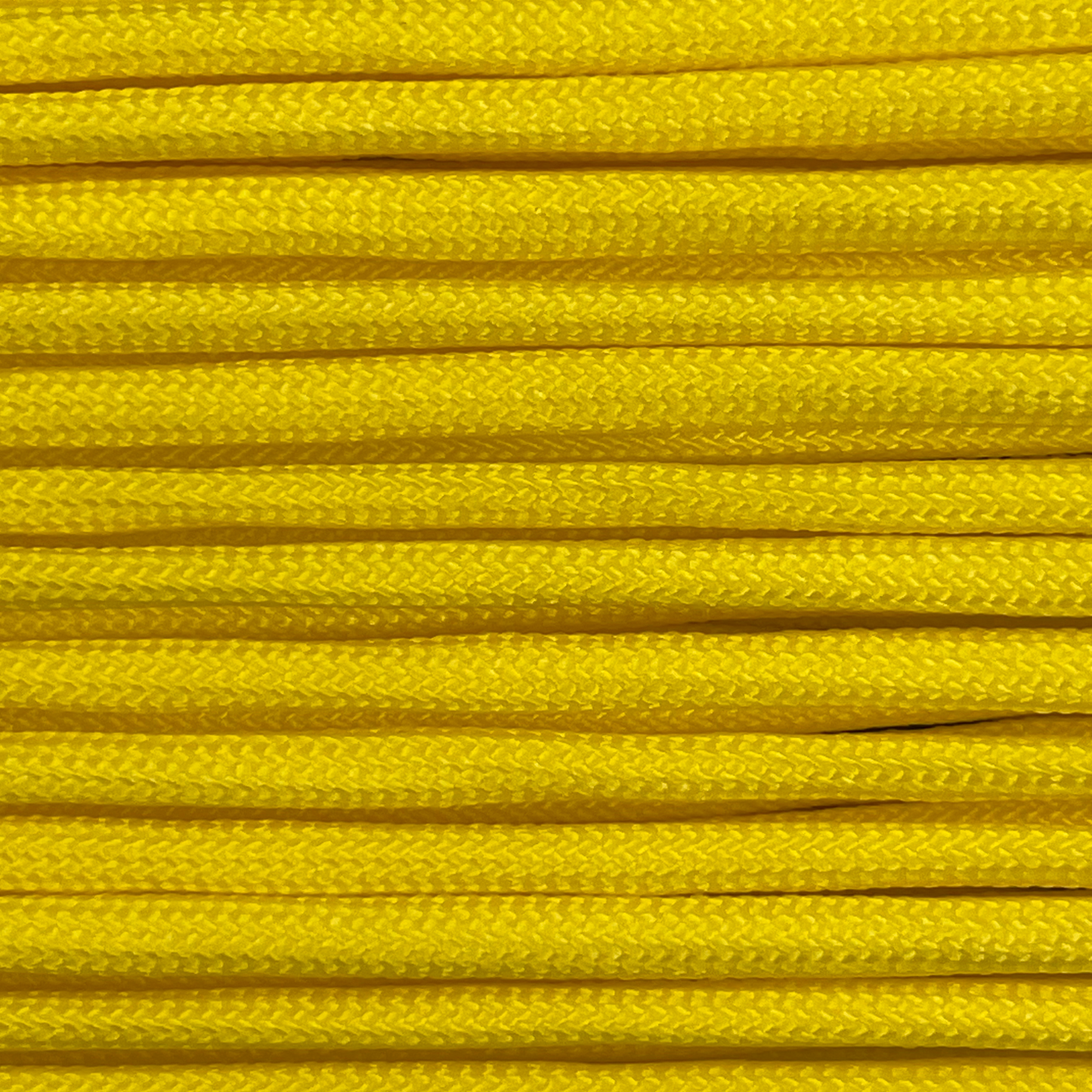 Close-up image of yellow 550 paracord, showcasing the vibrant colour and texture of the material.