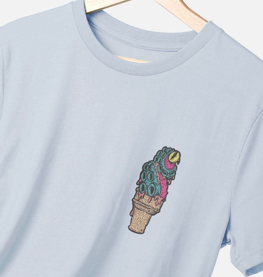 Sky blue t-shirt with a graphic of a surreal ice cream cone featuring blue and pink tentacles with a yellow eye.