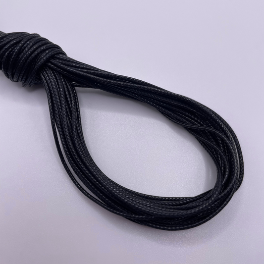 Close-up image of 1mm Waxed Cotton Cord, showcasing the vibrant colour and texture of the material.