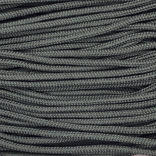Close-up image of Black 275 Paracord, showcasing the vibrant colour and texture of the material.