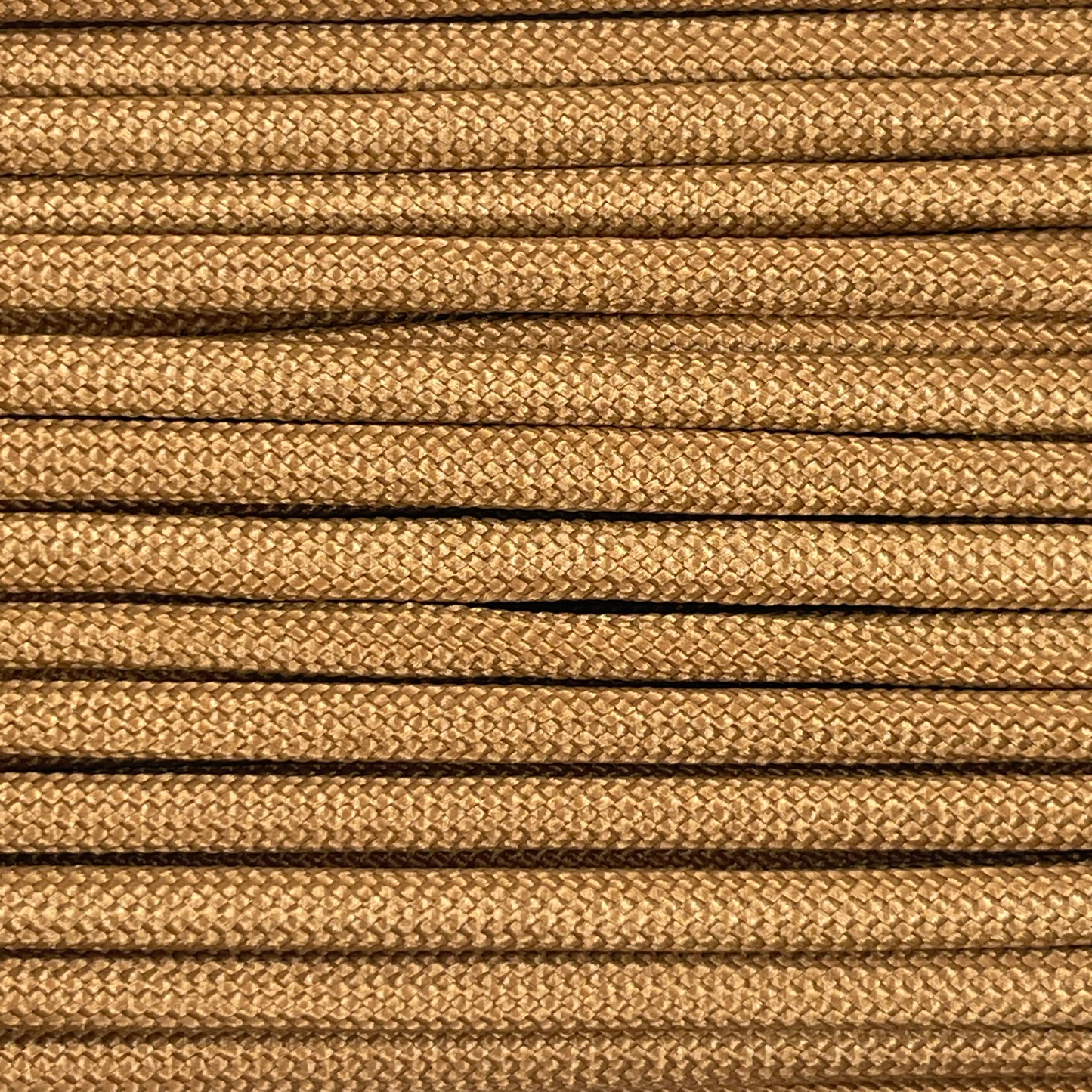 Close-up image of brown 550 paracord, showcasing the vibrant colour and texture of the material.