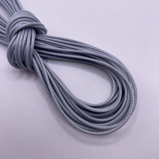 Close-up image of 1mm Waxed Cotton Cord, showcasing the vibrant colour and texture of the material.
