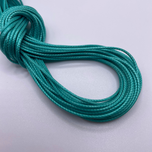 Close-up image of 1mm Waxed Cotton Cord, showcasing the vibrant colour and texture of the material.