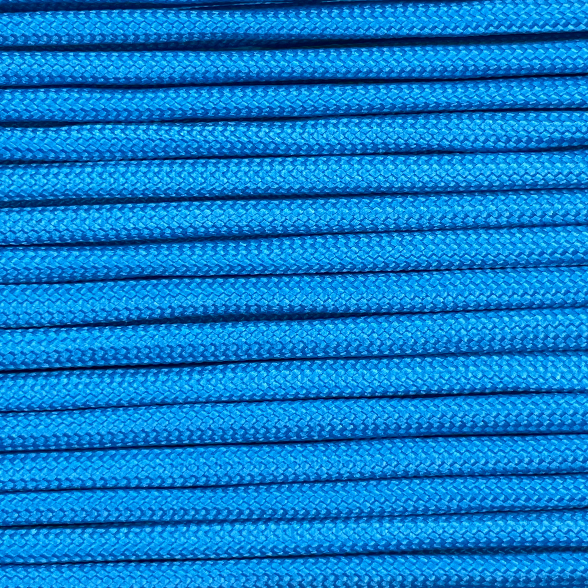 Close-up image of light blue 550 paracord, showcasing the vibrant colour and texture of the material.