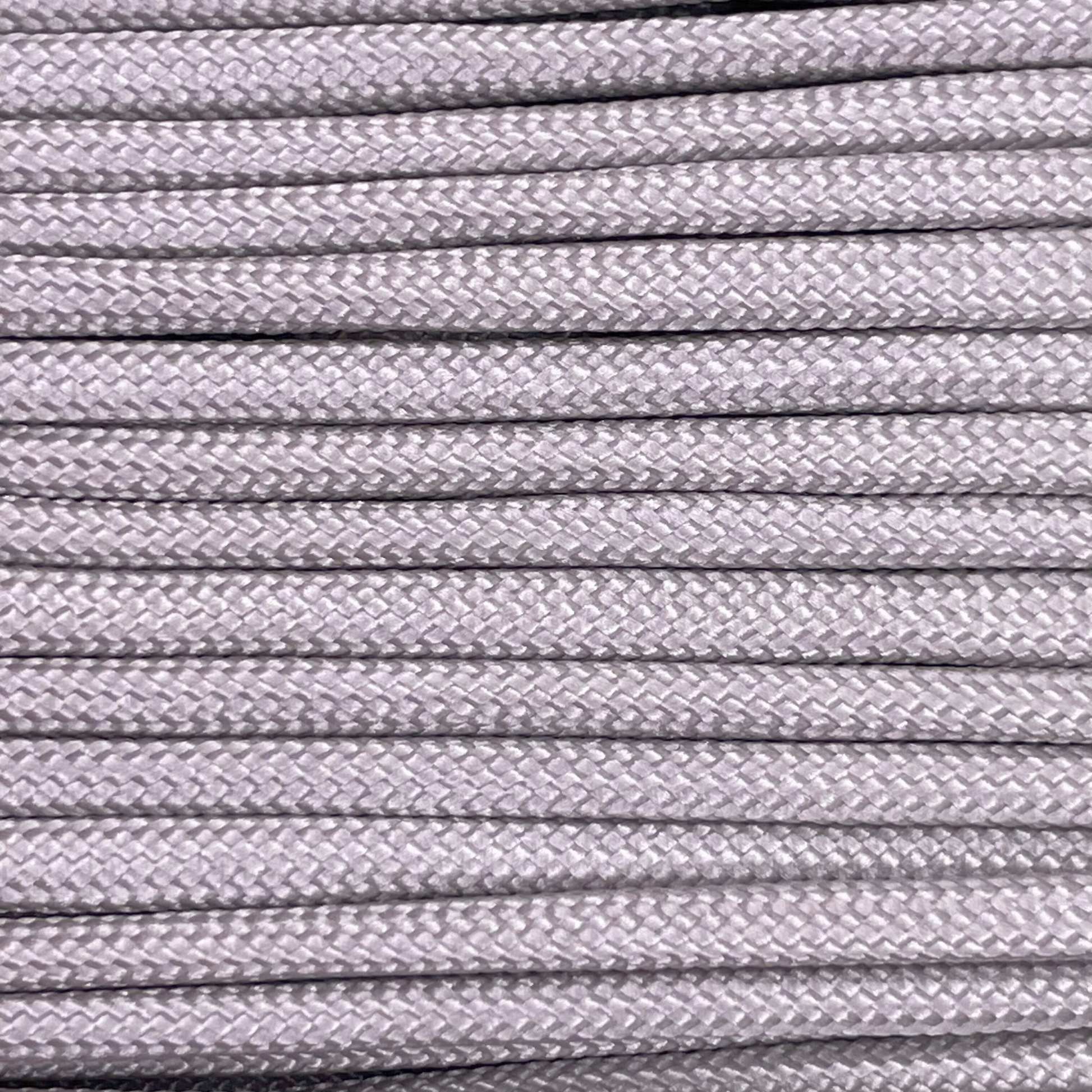 Close-up image of light grey 550 paracord, showcasing the vibrant colour and texture of the material.