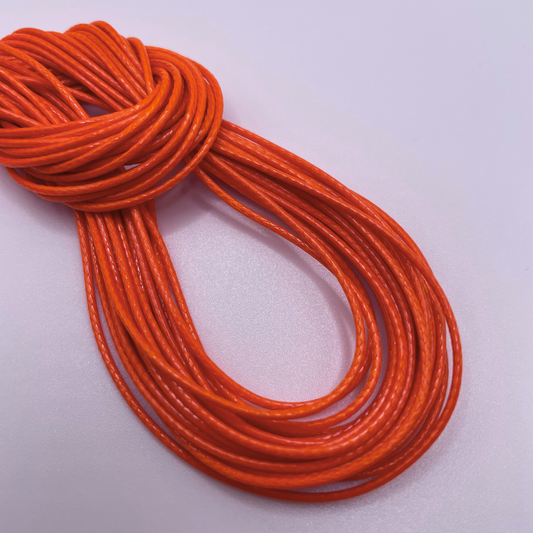 Close-up image of 1mm Waxed Cotton Cord, showcasing the vibrant colour and texture of the material.
