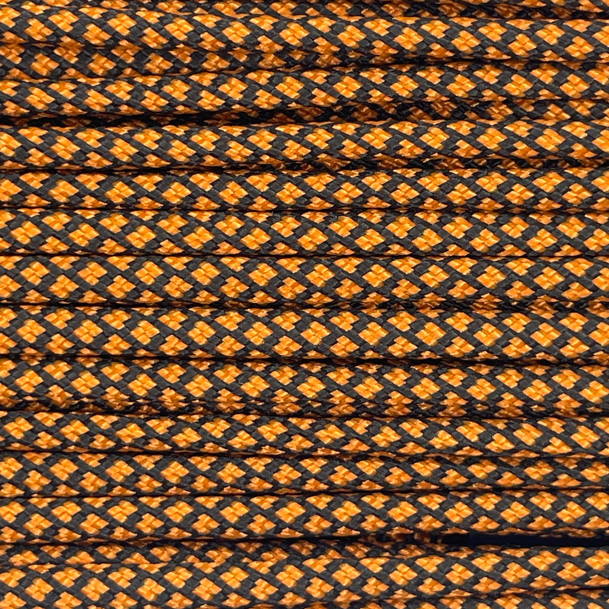 Close-up image of Orange Diamond 550 Paracord, showcasing the vibrant colour and texture of the material.