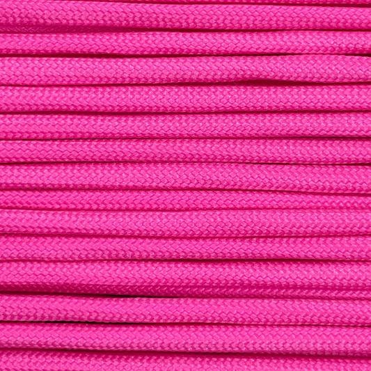 Close-up image of pink 550 paracord, showcasing the vibrant colour and texture of the material.