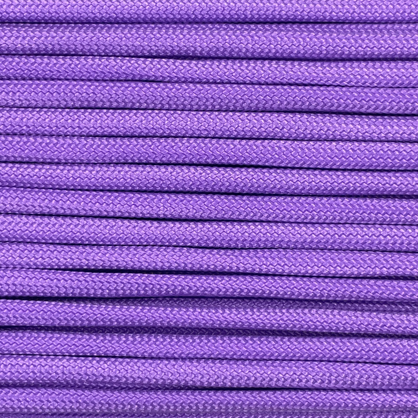 Close-up image of purple 550 paracord, showcasing the vibrant colour and texture of the material.