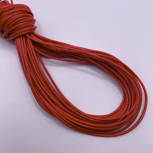 Close-up image of 1mm Waxed Cotton Cord, showcasing the vibrant colour and texture of the material.