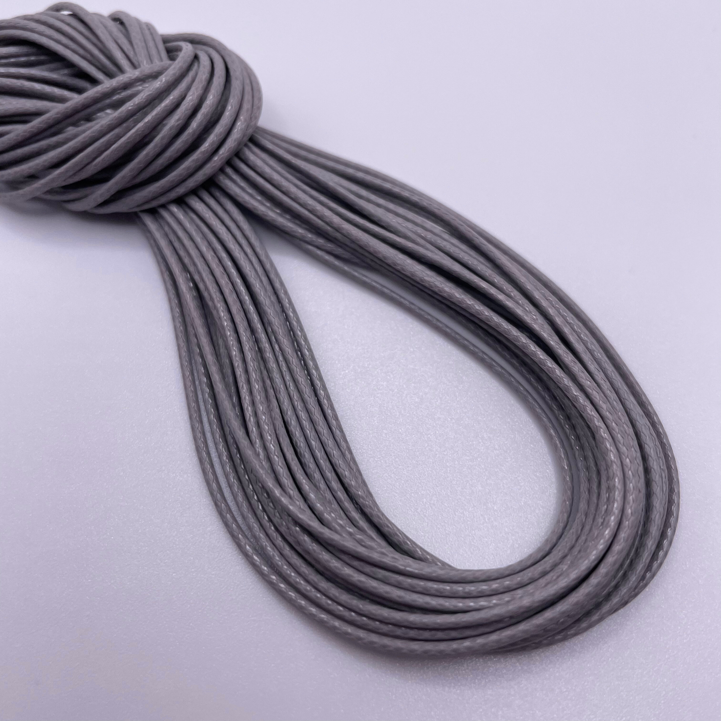 Close-up image of 1mm Waxed Cotton Cord, showcasing the vibrant colour and texture of the material.