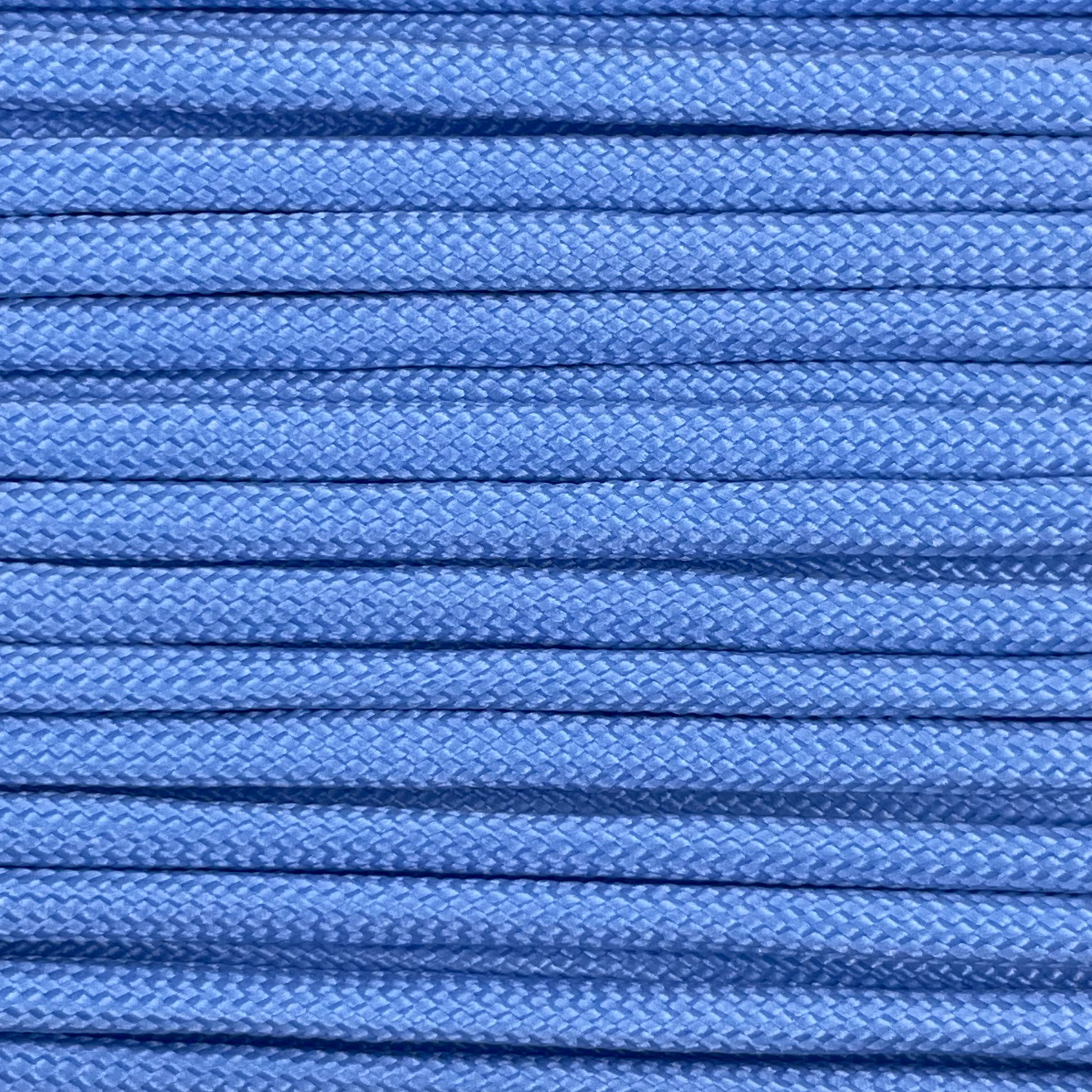 Close-up image of sky blue 550 paracord, showcasing the vibrant colour and texture of the material.