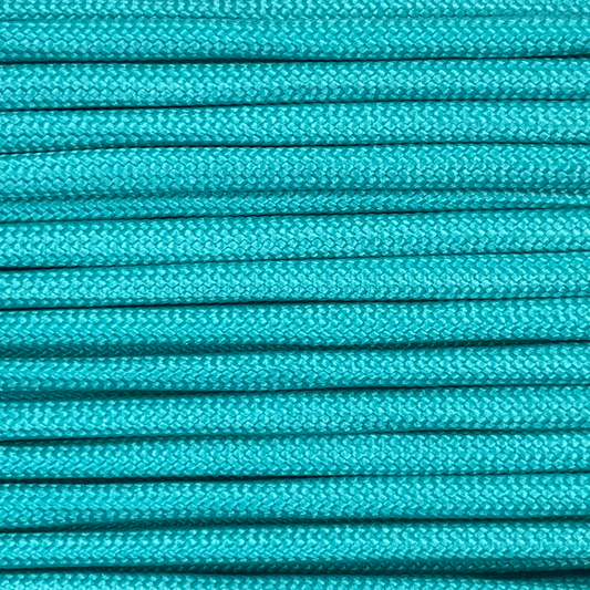 Close-up image of turquoise 550 paracord, showcasing the vibrant colour and texture of the material.