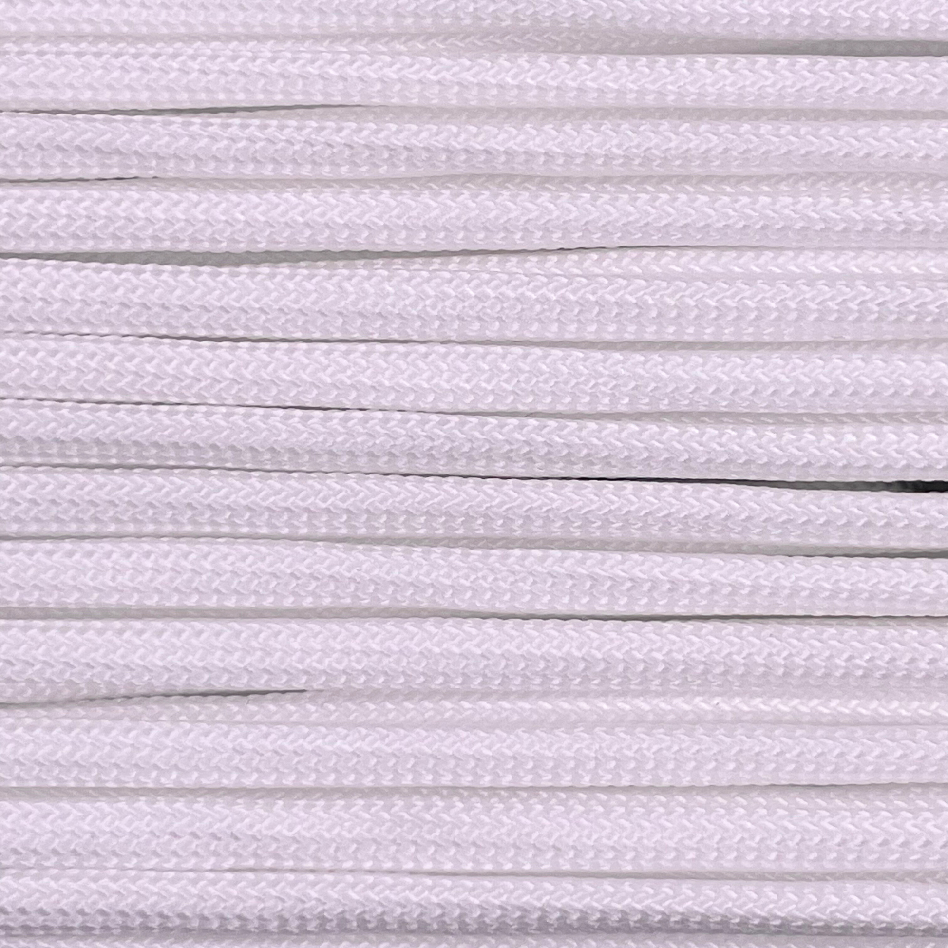 Close-up image of white 550 paracord, showcasing the vibrant colour and texture of the material.