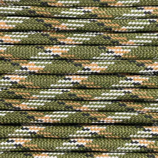 Close-up image of Woodland Camo 550 Paracord, showcasing the vibrant colour and texture of the material.
