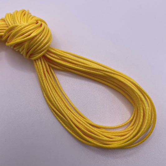Close-up image of 1mm Waxed Cotton Cord, showcasing the vibrant colour and texture of the material.