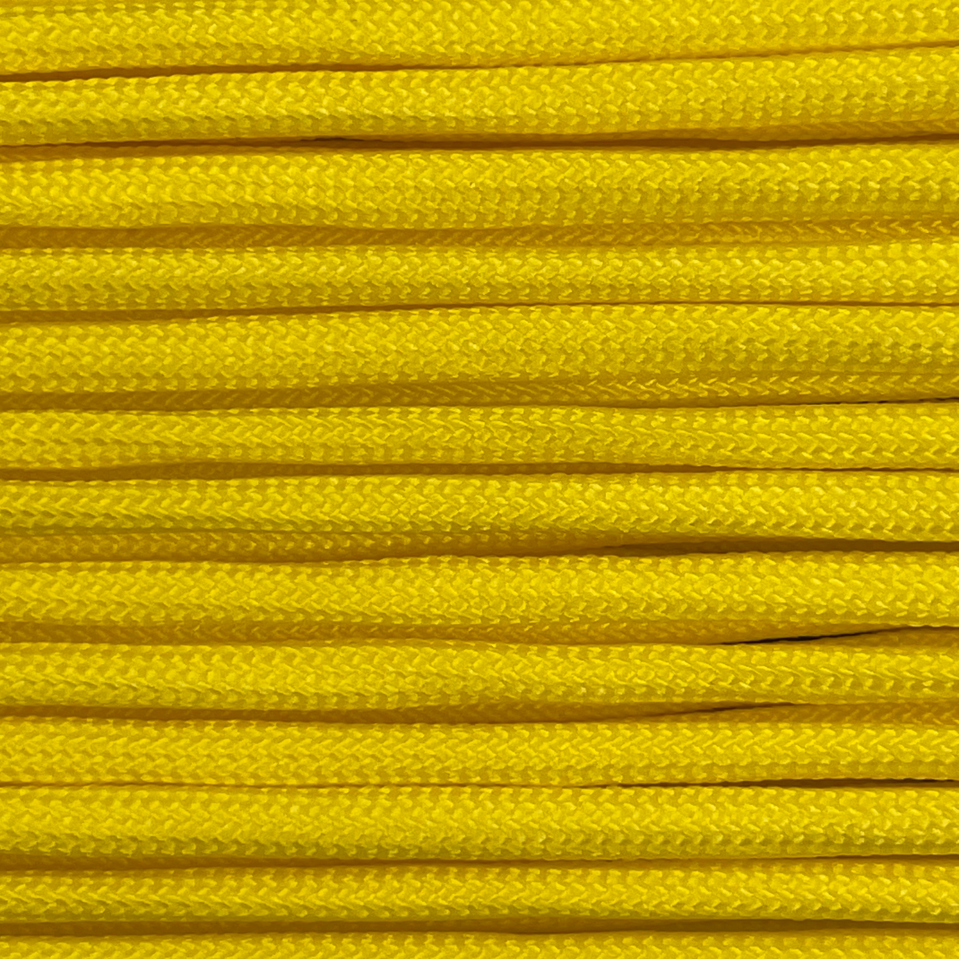 Close-up image of yellow 550 paracord, showcasing the vibrant colour and texture of the material.