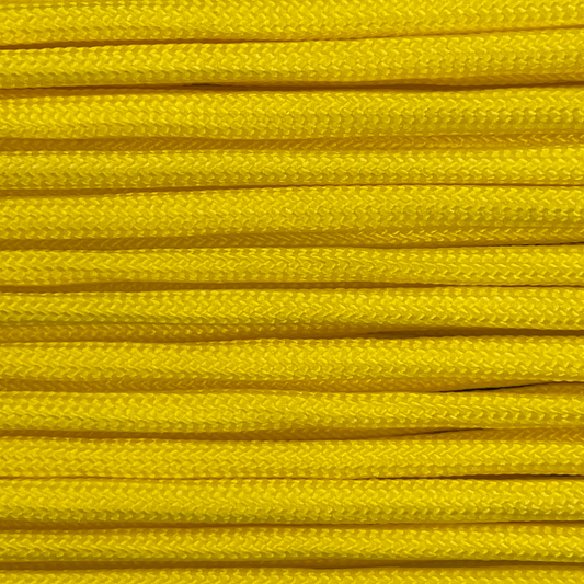 Close-up image of yellow 550 paracord, showcasing the vibrant colour and texture of the material.